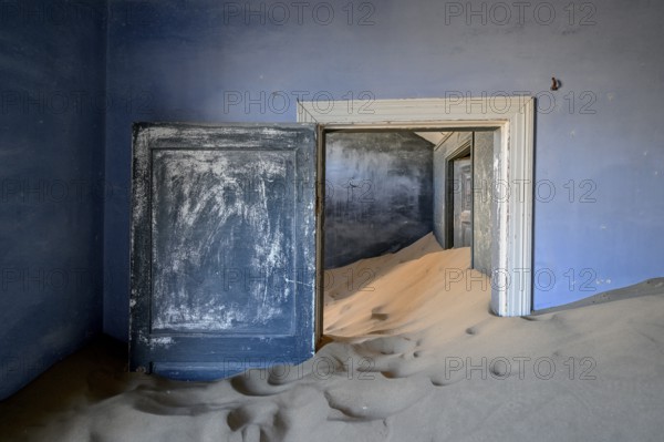 Former dwelling house full of sand, Kolmanskop, restricted diamond area, Karas region, Namibia