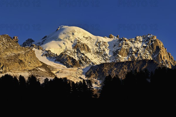 Aiguille des Grands Montets and snow-covered Aiguille Verte, Chamonix-Mont-Blanc, Haute-Savoie, France