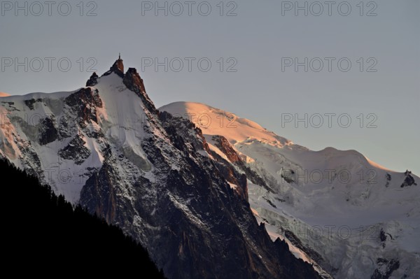From left snow-covered Aiguille du Midi, Mont-Blanc, Vallot Hut, Chamonix-Mont-Blanc, Haute-Savoie, France