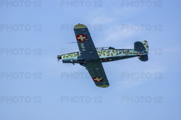 A Pilatus P-2 of Pilatus Flugzeugwerke AG with the registration D-EPII during a flight demonstration as part of an air show at the Rossfeld in Metzingen-Glems, Baden-Württemberg, Germany, for editorial use only