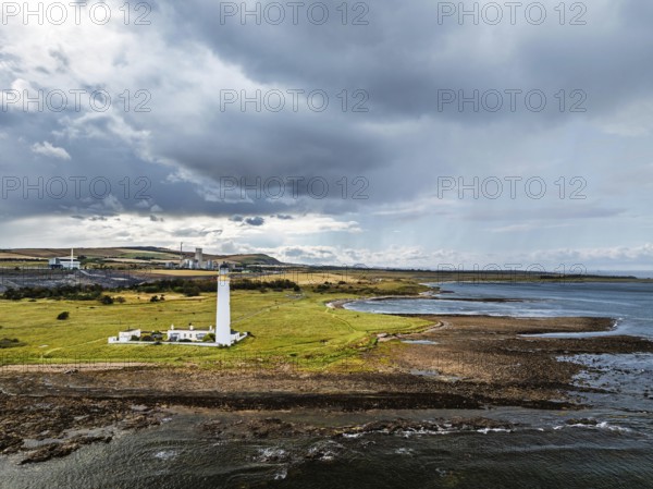 Rain Clouds over Barns Ness Lighthouse from a drone, Dunbar, East Lothian, Scotland, UK