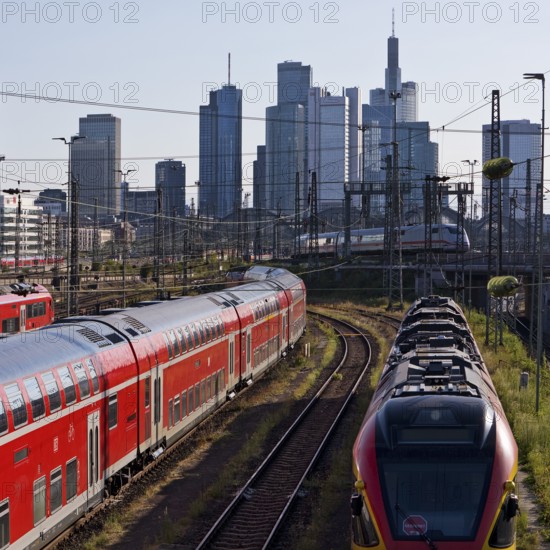 Elevated city view with many trains, railway station and skyscrapers, Frankfurt am Main, Hesse, Germany