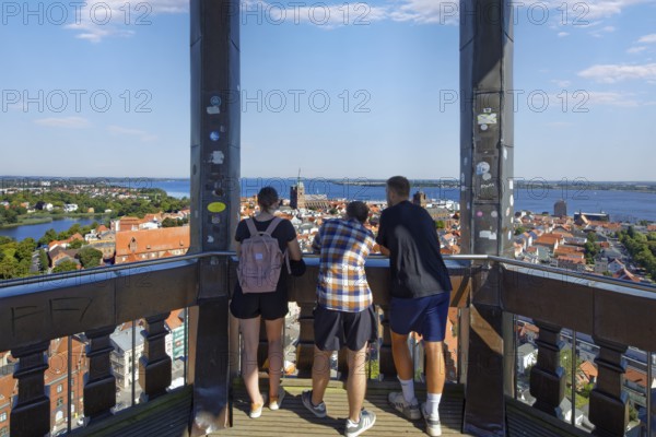 Visitors look out over the city, viewing platform view at a height of 84 metres, St. Mary's Church, also known as Marienkirche, basilica, late Gothic, three naves with transept, first mentioned in 1298, Neuer Markt, Old Town, UNESCO World Heritage Site, Hanseatic City of Stralsund, Mecklenburg-Western Pomerania, Germany