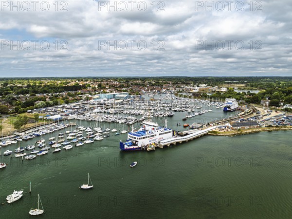 Wight Light car ferry to Isle of Wight on Lymington River and marina from drone, Lymington, New Forest, Hampshire, England, United Kingdom