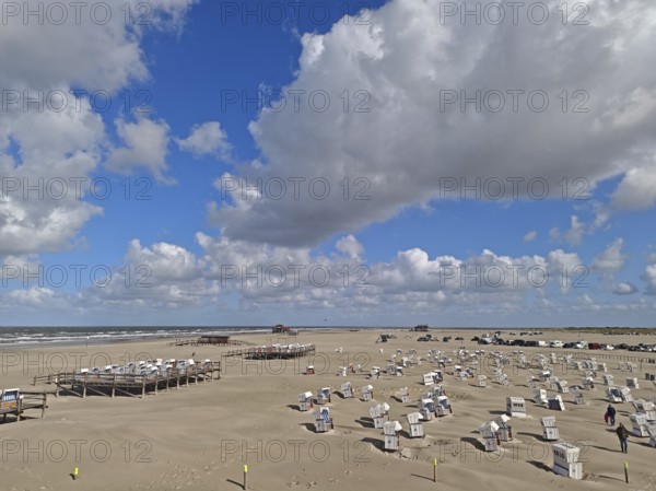 North Sea beach with sand drifts, car park, blue sky, white clouds, summer, sun, beach chairs, on the edge of the UNESCO World Heritage Site, Ording, Sankt Peter-Ording, Schleswig-Holstein, Germany