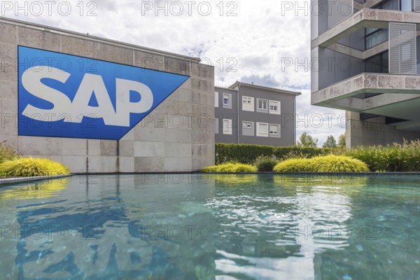Logo and building of the software company SAP SE. Walldorf, Baden-Württemberg, Germany