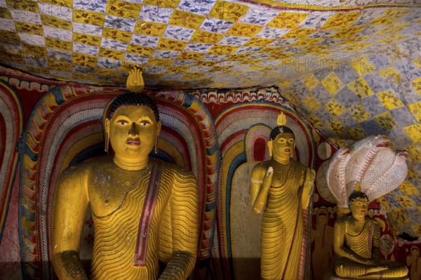 Buddha statues and murals in Dambulla Cave Temple, Dambulla, Sri Lanka