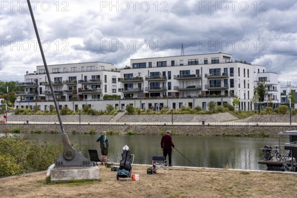 New Graf Bismarck urban quarter on the Rhine-Herne Canal, residential and commercial development on the site of the former Graf Bismarck colliery power station, marina, on the canal, in Gelsenkirchen, North Rhine-Westphalia, Germany