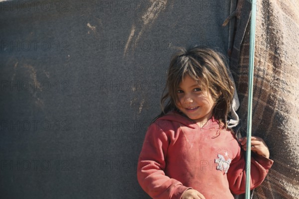 Syrian children playing in a refugee camp near the Turkish border on World Children's Day. Aleppo, Syria October 29, 2022, Aleppo, Syria