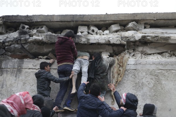 Civil defense teams attempt to rescue civilians trapped under the rubble after a powerful earthquake struck Turkey and Syria, killing tens of thousands. Aleppo, Syria – Feb 6, 2023, aleppo, syria