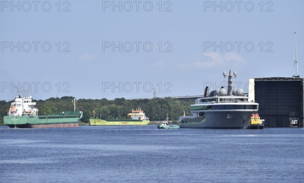 The new superyacht COSMOS leaves the Lürssen shipyard near Rendsburg for the Kiel Canal, Kielkanal, Kiel Canal, Schleswig-Holstein, Germany