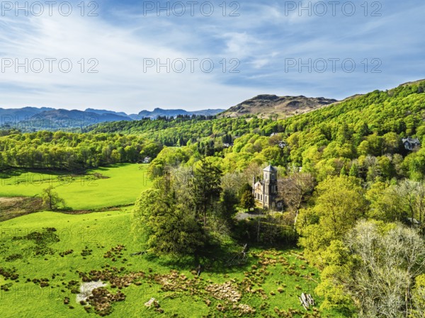 Holy Trinity Church from a drone, Bog Lane, Brathay village, Lake District, Cumbria, England, United Kingdom