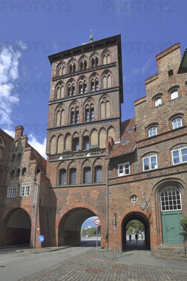 Historic castle gate and customs officers' house as parts of the former city fortifications, city gate, Brick Gothic, brick building, Old Town, Lübeck, Schleswig-Holstein, Germany