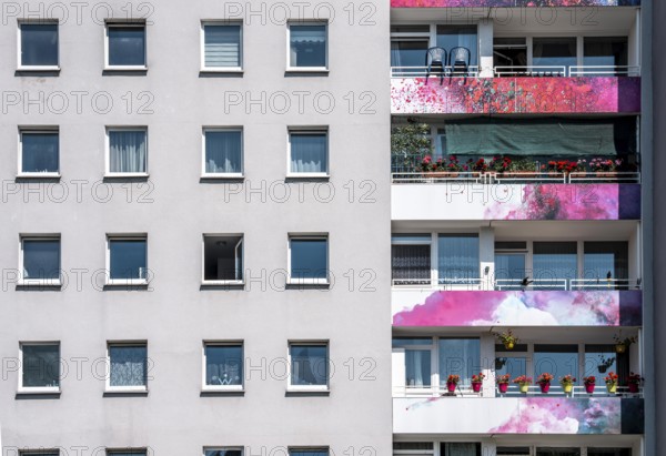 High-rise residential building, in Essen-Steele, with colourfully designed façade, balcony balustrades, after renovation, North Rhine-Westphalia, Germany