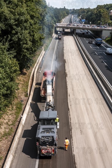 Rehabilitation of the A52 motorway near Essen, an 8 km long section between the Essen-Kettwig junction and the Essen-Ost motorway junction will be completely renovated over a period of 9 years, 6 lanes, new drainage pipes, carriageway, bridges, noise barriers, traffic facilities, here the last section, direction Düsseldorf, new carriageway surface, laying of porous asphalt, here the removal, milling, of the old carriageway in front of the application of the new whispering asphalt, Essen, North Rhine-Westphalia, Germany