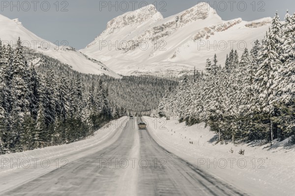 Winter road trip on the Icefields Parkway with lots of snow and ice, Banff National Park, Jasper National Park, Alberta, Canada