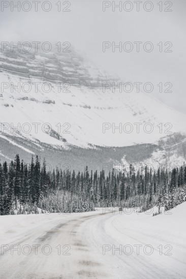 Winter road trip on the Icefields Parkway with lots of snow and ice, Banff National Park, Jasper National Park, Alberta, Canada