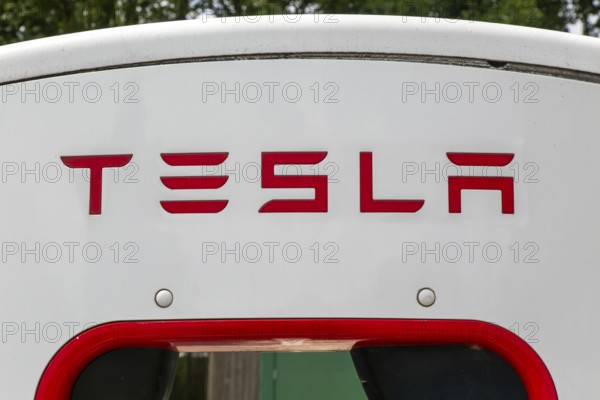 Charging point facility for Tesla electric vehicles at service station, M25 South Mimms services, Hertfordshire, England, UK