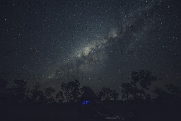 Milky Way in the Australian outback. Camping in a Landrover rooftop tent, Australia