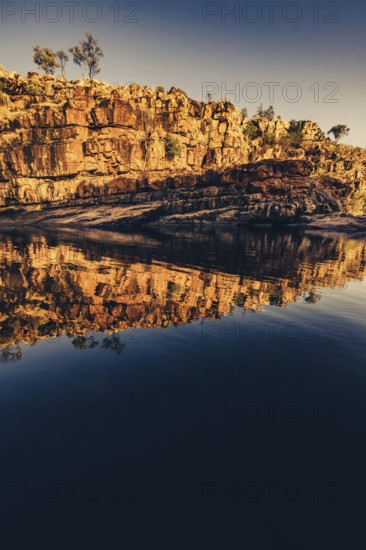 Bell Gorge waterfall, a body of water in north-west Australia in the Kimberley. Sunrise in the outback, Australia