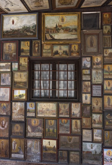 Votive plaques in the walkway around the Chapel of Grace, Kapellplatz, place of pilgrimage, Altötting, Upper Bavaria, Bavaria, Germany