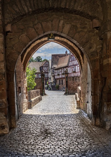 The old castle with Barbarossaplatz and the castle café in the old town centre of Büdingen, Hesse, Germany