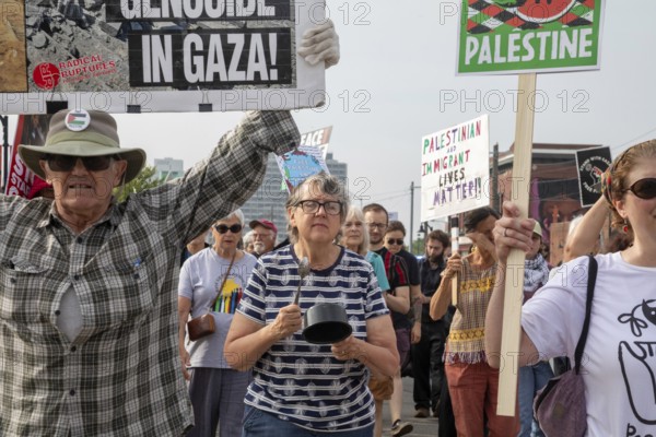 Detroit, Michigan USA - 26 July 2025 - Protesters rally at Eastern Market, banging empty pots to protest starvation in Gaza