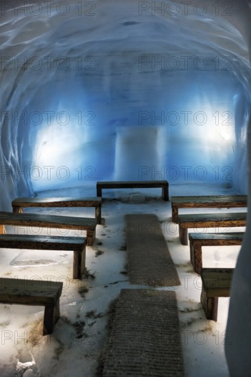 Ice tunnel, wooden benches, illuminated glacier cave, illustration, Langjökull glacier, Husafell, Iceland