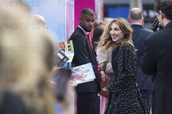 Erica Huggins (producer) in front of the film premiere of Die Nackte Kanone at the UCI Luxe East Side Gallery, Berlin, 24.07.2025