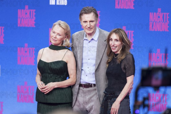 Pamela Anderson, Liam Neeson and Erica Huggins (producer) at the film premiere of The Naked Gun at UCI Luxe East Side Gallery, Berlin, 24.07.2025