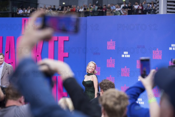 Pamela Anderson between fans at the film premiere of The Naked Gun at UCI Luxe East Side Gallery, Berlin, 24.07.2025