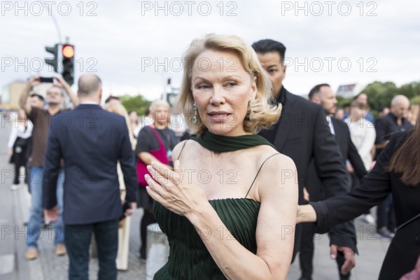 Pamela Anderson attends the film premiere of The Naked Gun at the UCI Luxe East Side Gallery, Berlin, 24.07.2025