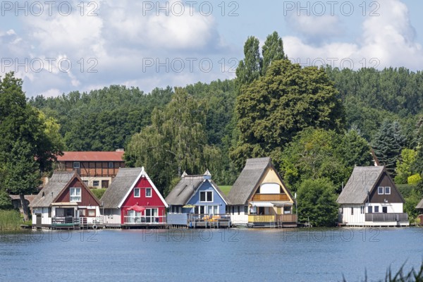 Boathouses, holiday homes on Lake Mirow, Mirow, Mecklenburg Lake District, Mecklenburg-Western Pomerania, Germany