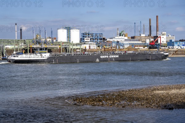 Scenery of Chempark Leverkusen, Bayer Leverkusen, chemical park, chemical plant, river Rhine, cargo ship, North Rhine-Westphalia, Germany