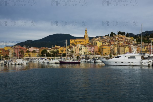 Town with colourful houses by the sea, sunrise, Menton, Alpes Maritimes, Provence Alpes Cote d'Azur, French Riviera, South of France, France