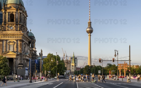 Road traffic and pedestrians on the carriageway in Berlin-Mitte, Unter den Linden, Berlin, Germany