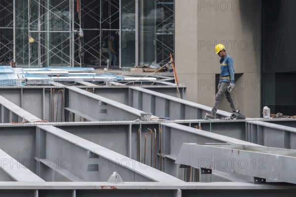 Iron girder construction worker, Bangkok, Thailand