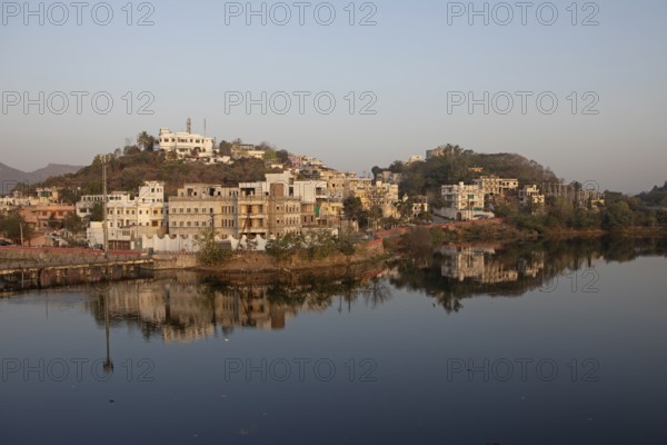 Udaipur and the Swaroop Sagar Lake in the morning light, Rajasthan, India