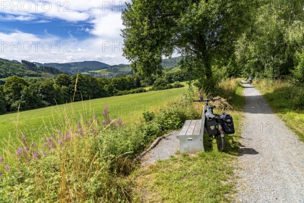 Sauerlandring cycle path, an 84 km long circular cycle path between the towns of Finnentrop, Eslohe, Schmallenberg and Lennestadt, mostly on former railway lines, here near Schmallenberg, Sauerland, North Rhine-Westphalia, Germany