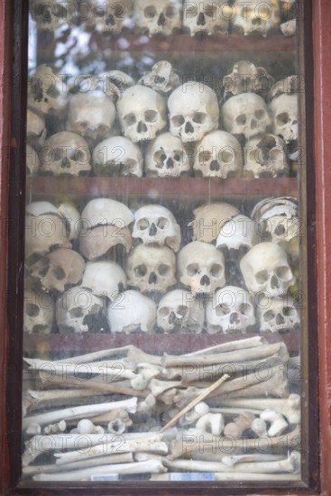 Shrine with human skull, memorial to the victims of the Khmer Rouge regime, Wat Thmei, Siem Reap, Cambodia