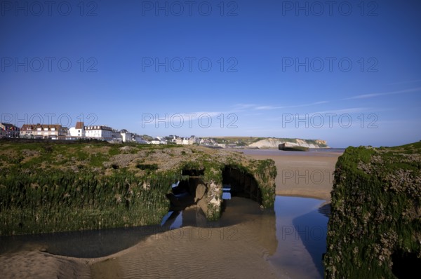 Phoenix Caissons, concrete boxes, caissons, were used in the sea as breakwaters and to form an improvised harbour, Mulberry B Harbour, Mulberry Harbour, Port Winston, Gold Beach, beach, D-Day, Operation Overlord, Arromanches-les-Bains, Normandy, Calvados, France
