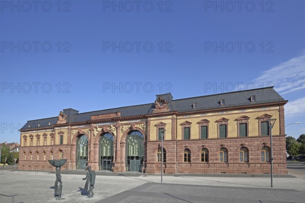 Old Post Office built in 1893 and sculpture of a woman wearing shoes, monument to the former shoe industry, Neo-Renaissance, Joseph-Krekeler-Platz, Pirmasens, Rhineland-Palatinate, Germany