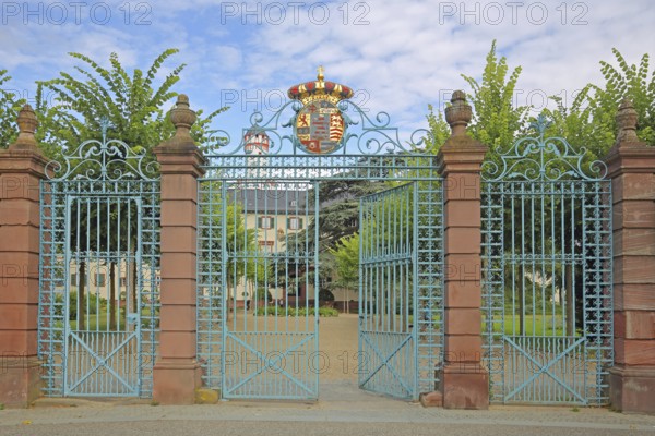 Gate entrance with metal gate, decorations and coat of arms, white tower, wrought ironwork, handicraft, metal grille, door, open, open, castle park, castle, Bad Homburg, Taunus, Hesse, Germany