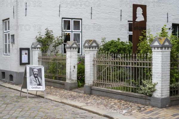Sign and fence at the Theodro Storm House, Theodor Storm Centre, Museum, Old Town, Husum, North Frisia, Schleswig-Holstein, Germany