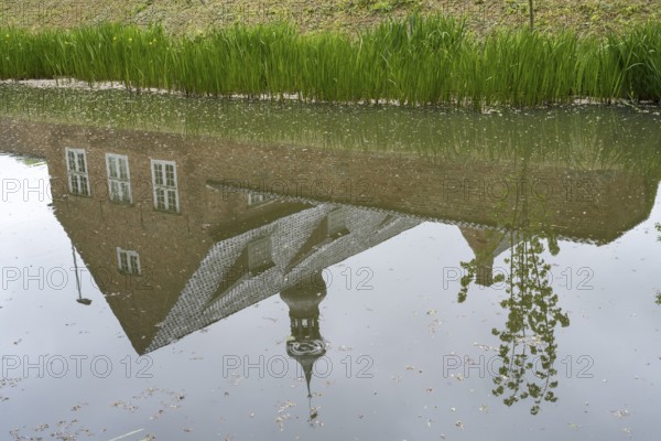 Husum Castle, Castle in front of Husum, moat, reflection, Husum, North Frisia, Schleswig-Holstein, Germany