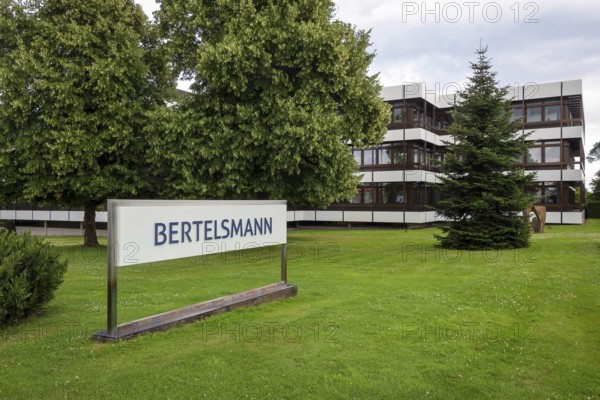 Gütersloh, North Rhine-Westphalia, Germany - BERTELSMANN, Head Office of Bertelsmann SE & Co. KGaA. Bertelsmann is an international media, services and education company headquartered in Gütersloh. The Bertelsmann Stiftung is one of the largest German foundations. Bertelsmann's operating divisions include RTL Group (entertainment), Penguin Random House (books), BMG (music), Arvato Group (services), Bertelsmann Marketing Services (direct marketing and print activities), Bertelsmann Education Group (education) and Bertelsmann Investments (venture capital activities and growth division Bertelsmann Next)