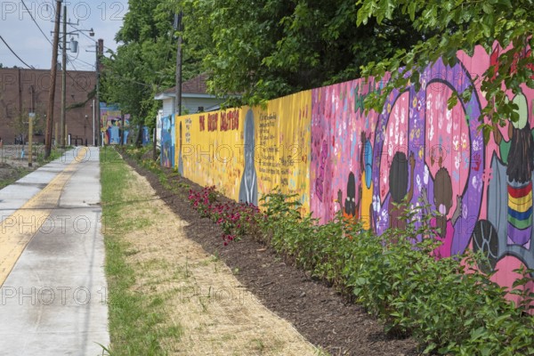 Detroit, Michigan - The city of Detroit is opening nine 'Arts Alleys' in neighborhoods around the city. The Yellow Brick Road Arts Alley provides a space for children to ride their bikes and learn about African-American history