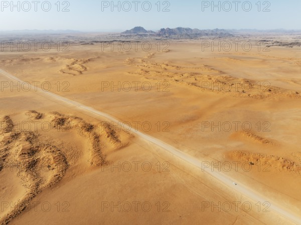 The C14 gravel road at the edge of the Namib Desert. Aerial view. Drone shot. Namibia