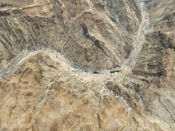 The Fish River Canyon with a length of 160 km is the second largest canyon in the world and the largest in Africa. Aerial view. Drone shot. Ai-Ais Richtersfeld Transfrontier Park, Namibia