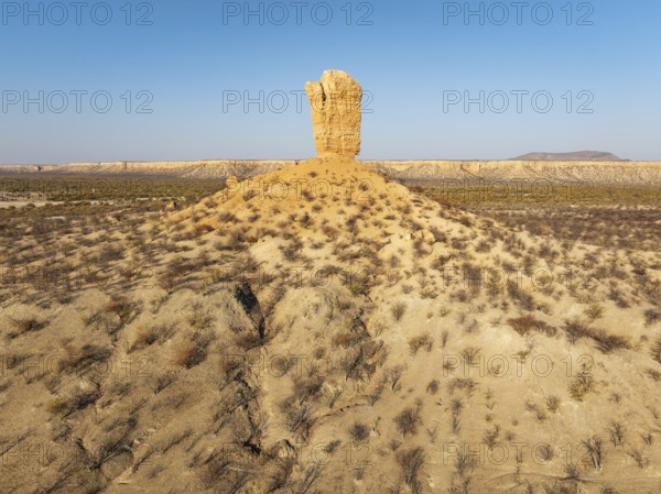 The Vingerklip (rock finger) and the Ugab Valley Terraces are surrounded by thornbush and mopane (Colophospermum mopane) savanna. Aerial view. Drone shot. Damaraland, Namibia